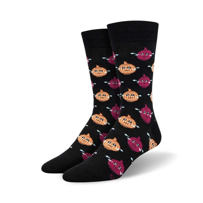 Pair of black crew socks with repeating pattern of cartoon onions in yellow and purple with small tears, shown from the side. }}
