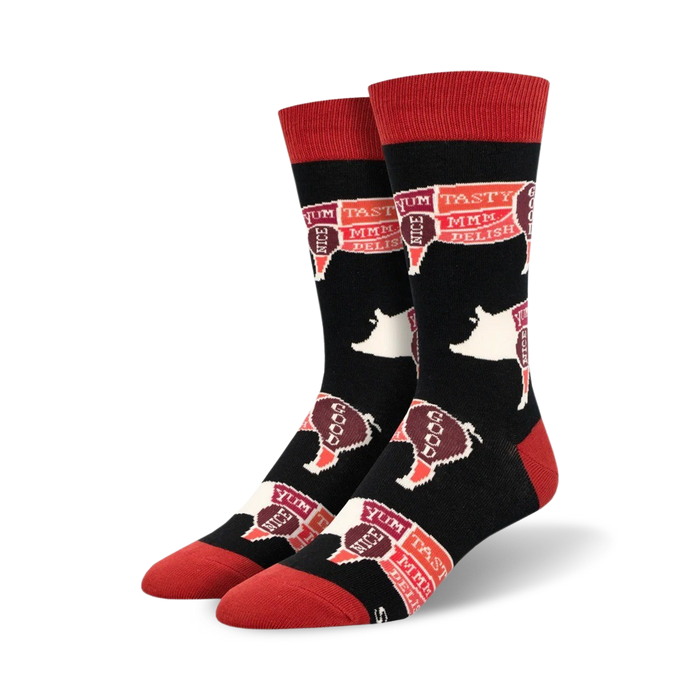 black crew socks with red toe, heel and top feature a white outline of a pig on each sock.   }}