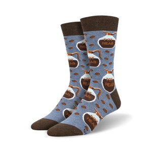 Pair of crew socks in blue and brown, featuring a repeating pattern of coffee pots and coffee beans with the words 'Pot Head'.
