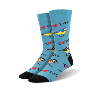 Lifestyle shot showing the teal 'I Heart Tits' socks on a person's feet.