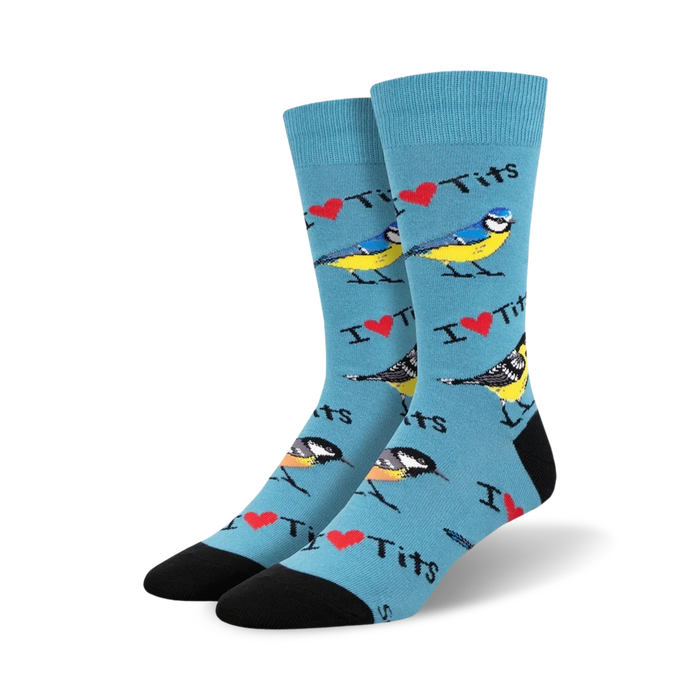 Lifestyle shot showing the teal 'I Heart Tits' socks on a person's feet.