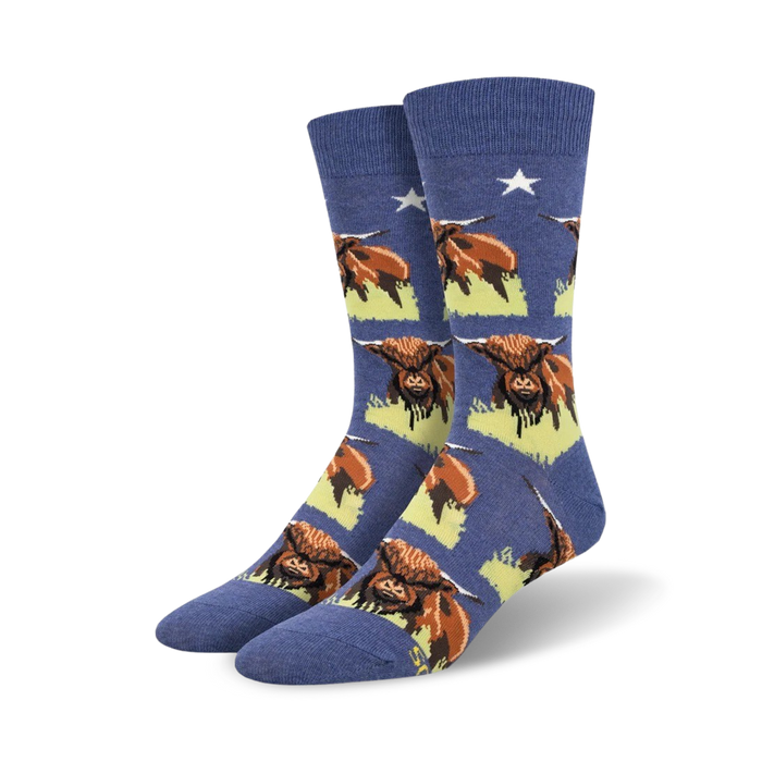 blue crew socks with highland cows on green grass and white stars.    }}