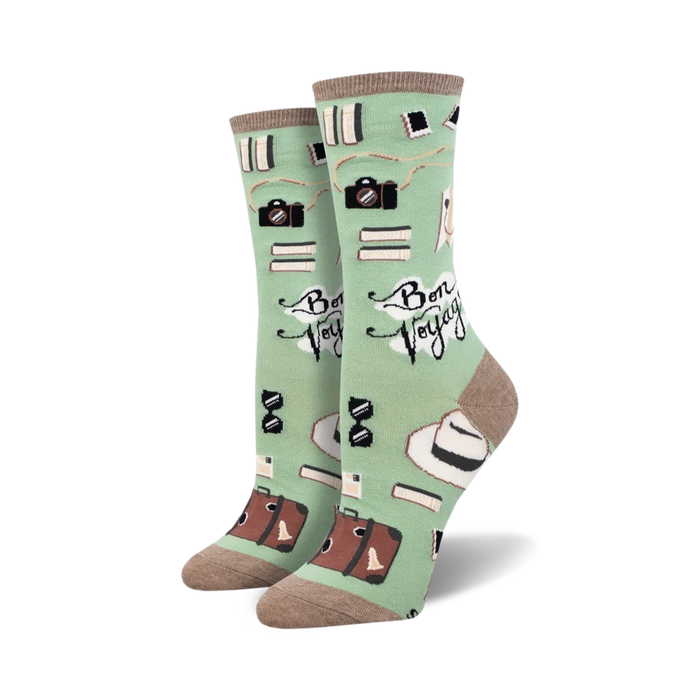 Lifestyle shot showing the mint green 'Bon Voyage' socks on a person's feet.