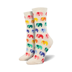 Pair of cream crew socks with a repeating pattern of colorful cartoon elephants.