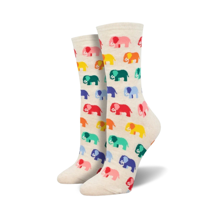 Pair of cream crew socks with a repeating pattern of colorful cartoon elephants.