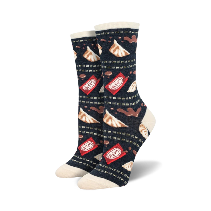 A pair of women's crew socks in navy blue, decorated with illustrated gyoza dumplings and red soy sauce packets. }}