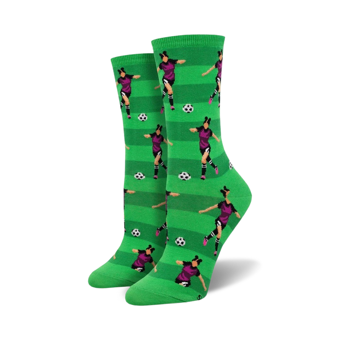 Close-up view of the Soccer Star socks, showcasing the detailed design of the female soccer player and the green and white striped background.