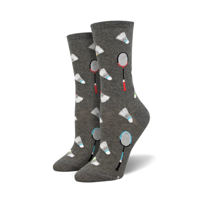 Pair of grey crew socks with a fun badminton-themed design. White shuttlecocks and teal and red rackets are scattered across the socks.