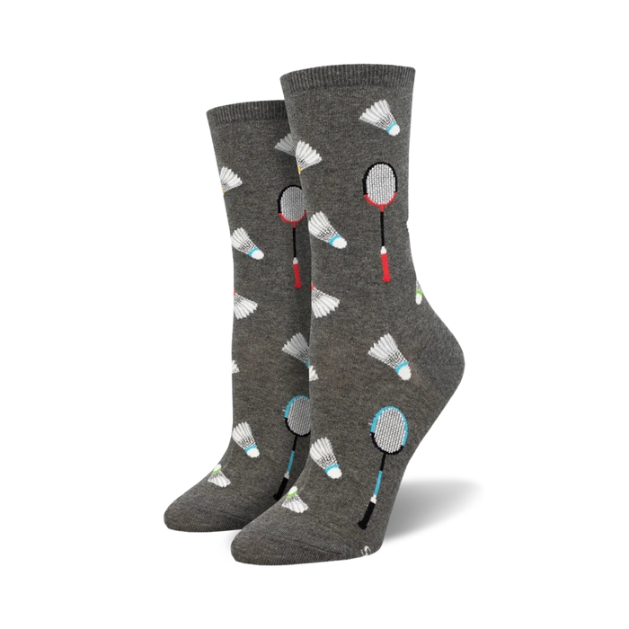 here's a matter-of-fact alt text description:  women's crew socks in gray with a pattern of red, blue, yellow, and white badminton shuttlecocks and blue and red badminton rackets.    }}