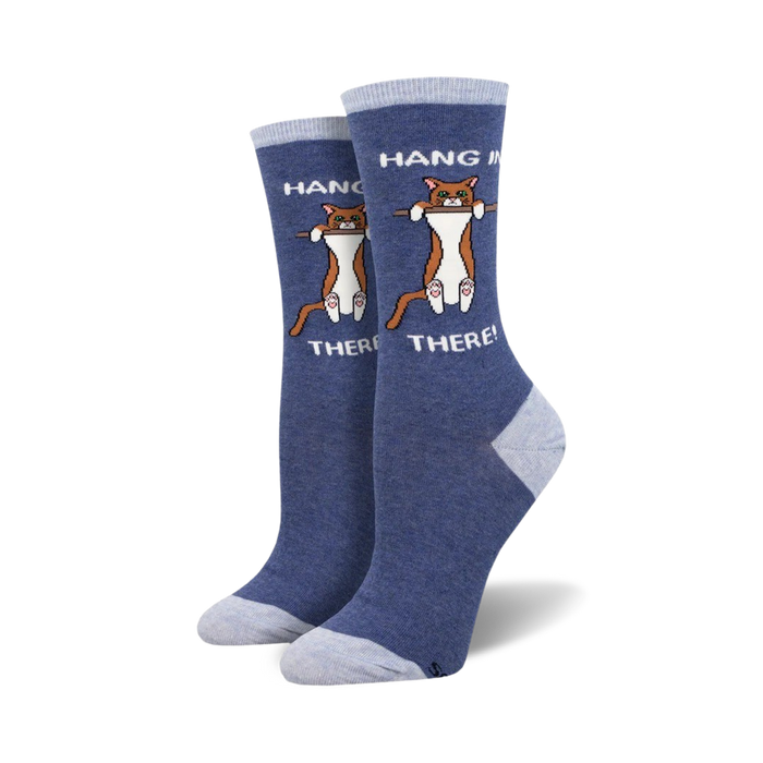 blue and white womens crew socks with orange cat clinging to a branch picture and 