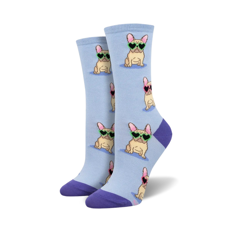 A pair of light blue crew socks with a repeating pattern of French Bulldogs wearing heart-shaped sunglasses. The socks have purple cuffs.