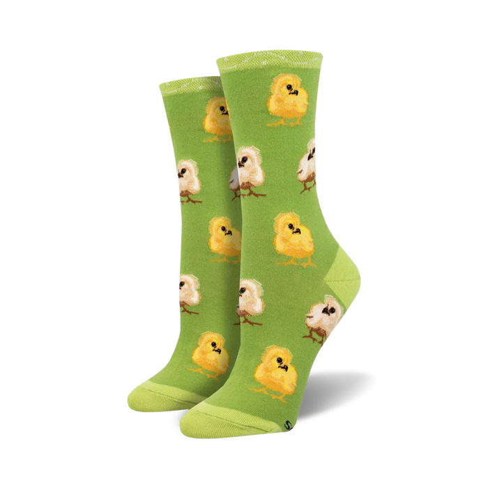 Lifestyle shot showing the green chick socks on a model's feet.