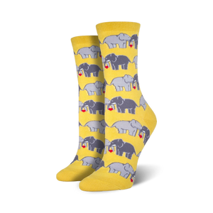 Pair of women's crew socks in yellow and grey, featuring a repeating pattern of elephants playfully holding hearts.