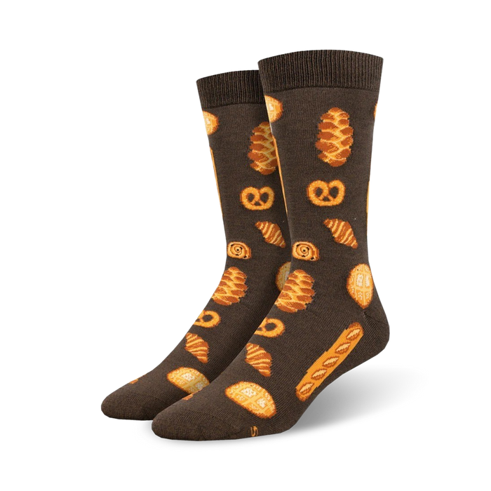 grey crew socks for men with orange and yellow bakery-themed crew socks with croissants, pretzels, bread, and other pastries    }}