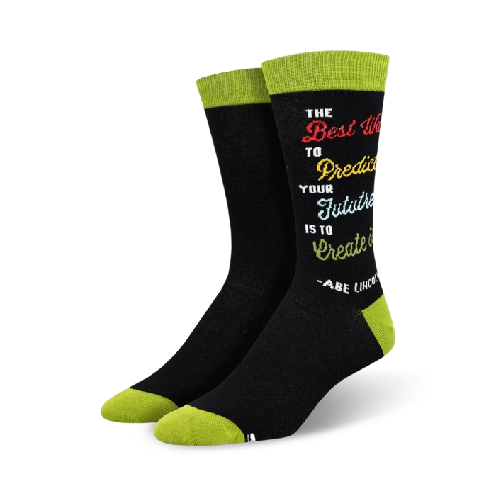 inspirational black socks with rainbow-colored text and green toe and heel. reads 