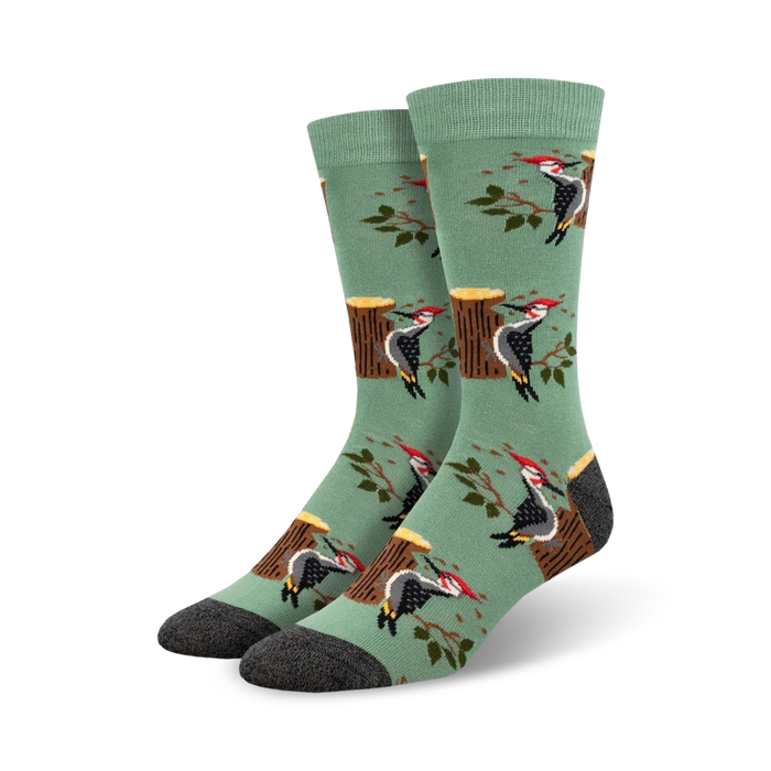 green crew socks with a woodpeckers and tree stump pattern.    }}