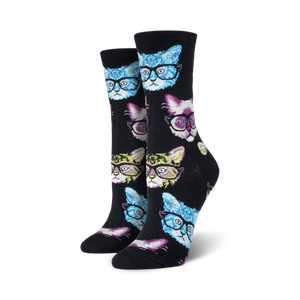 Lifestyle shot of a person relaxing with a book and a cup of coffee, wearing Kittenster socks.
