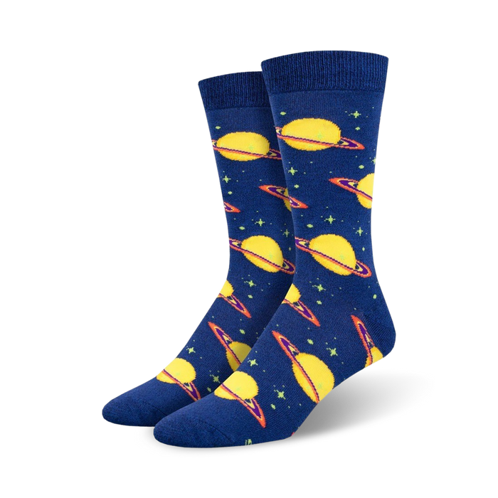 Pair of crew socks in navy blue with a pattern of yellow planets and rings. Stars are scattered on the background. Made of bamboo. }}