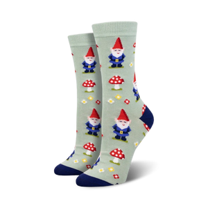 Pair of crew socks, sage green, featuring gnomes, mushrooms, and flowers.