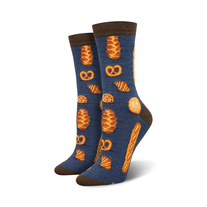 bakery themed crew socks in blue. various baked goods in orange and brown include croissants, pretzels and bread.    }}