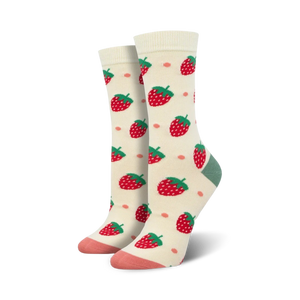 Close-up of Strawberry Delight Bamboo socks in cream color showing strawberry pattern and peach and teal details.