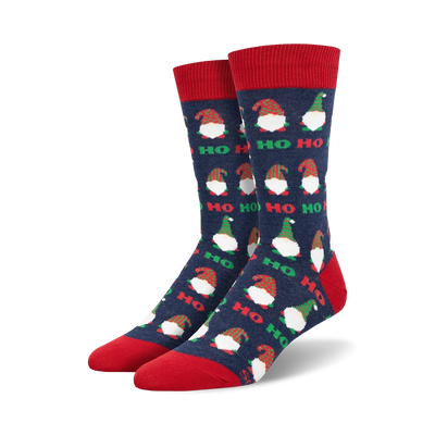 Pair of crew socks with navy blue background, red and green gnomes, and 'Ho Ho Ho' text.