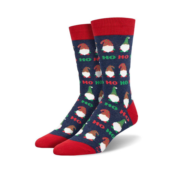 Pair of crew socks with navy blue background, red and green gnomes, and 'Ho Ho Ho' text.
