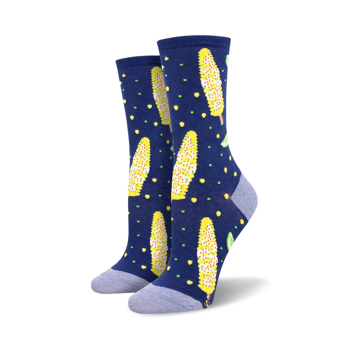 Pair of women's crew socks.  Navy blue background with yellow Elote (Mexican street corn) designs, lime accents, and yellow polka dots. }}