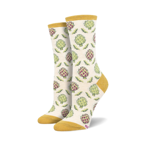 Cream crew socks with a repeating pattern of green and purple artichokes. Mustard yellow cuffs.