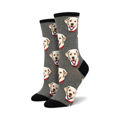 Pair of crew socks with a repeating pattern of yellow Labrador Retriever faces on a grey background. Black cuffs.