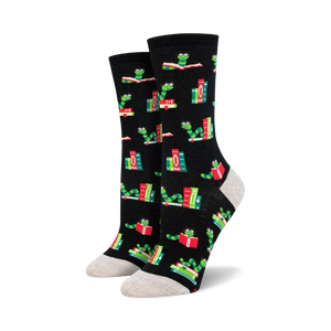 crew-length women's socks in black, featuring a pattern of verdant worms wearing scarlet glasses and engrossed in vibrant tomes.  