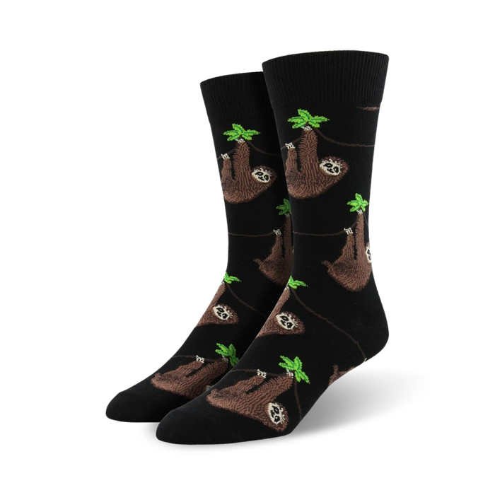 black crew socks with brown, cream, and black sloths hanging from green leaves.   }}