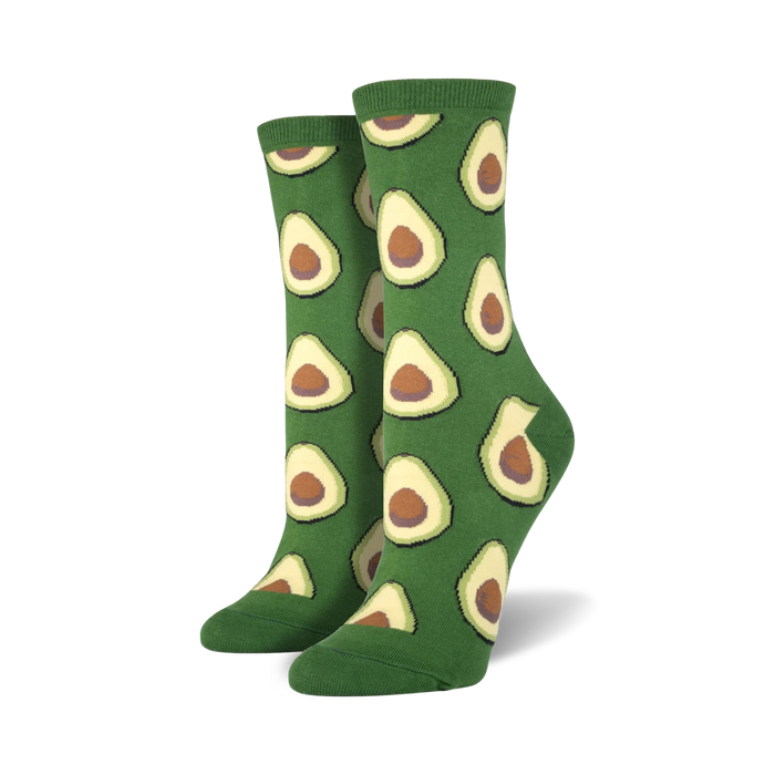 Lifestyle shot of a person wearing green avocado crew socks.