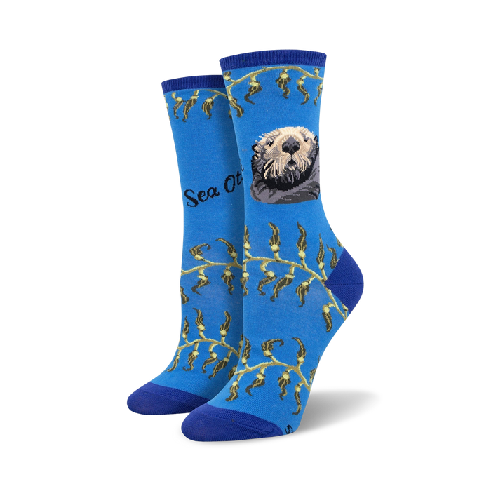 Crew socks in blue featuring a sea otter, kelp design, and 'Sea Otter' text. }}