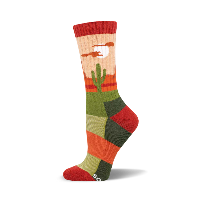 Crew socks in orange, green, and beige, with a desert landscape including a cactus and moon graphic. }}