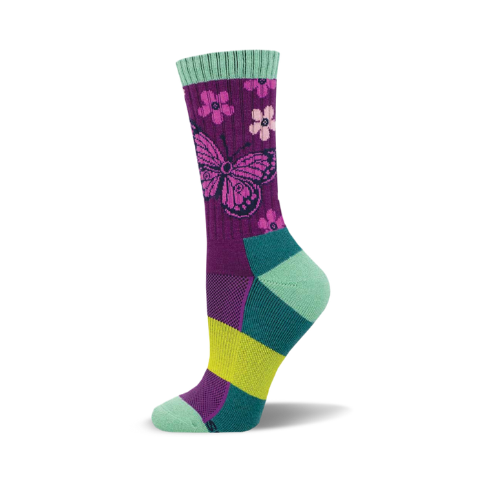 Crew socks in purple, teal, and lime green. The main design is a pink butterfly and small flowers on a purple background. }}