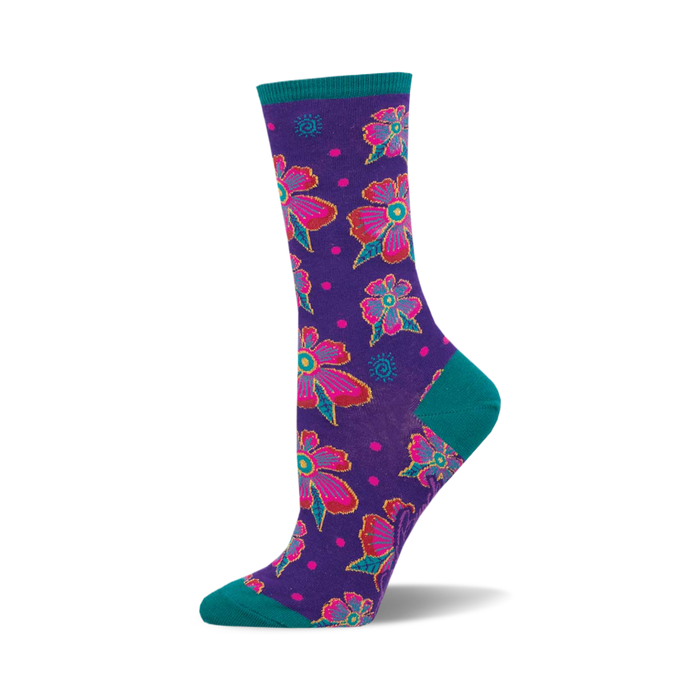 Crew socks in purple with a teal cuff. The design features pink and teal flowers with smaller details. }}