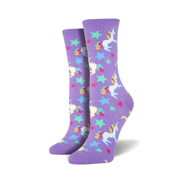 Lifestyle shot of a person wearing purple unicorn crew socks. The socks are shown from the knees down.