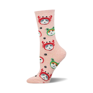 A single pink crew sock standing upright, featuring a pattern of grey and white cats wearing red crab and green frog hats.