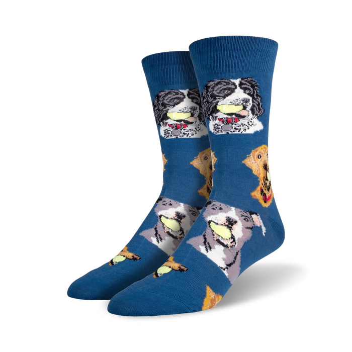 A pair of crew socks in blue featuring various dogs playfully holding tennis balls. The dogs are in shades of grey, black, and brown. }}