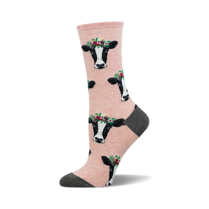 Lifestyle shot of 'Wow Cow' socks on a person's feet, showcasing the socks' light pink color and design.