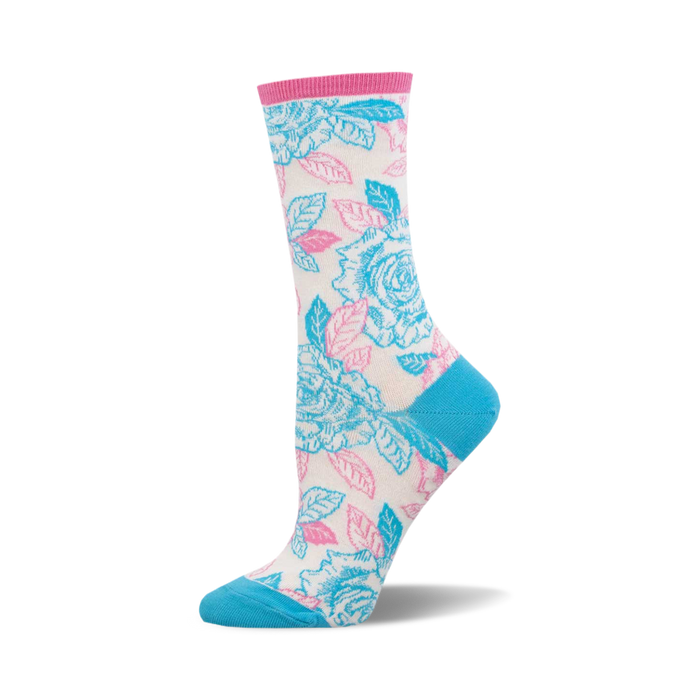 socks with a pattern of pink and blue roses with green leaves on a white background. the top of the sock is pink. the heel and toe are blue. }}