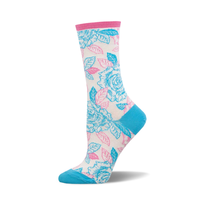 Cream crew socks with a vibrant floral design. Features blue and pink roses with green leaves. A pop of teal blue at the toe and cuff. }}