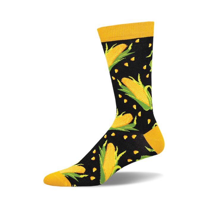 socks that are black with a pattern of yellow corncobs with green husks. the top of the sock is solid yellow. }}