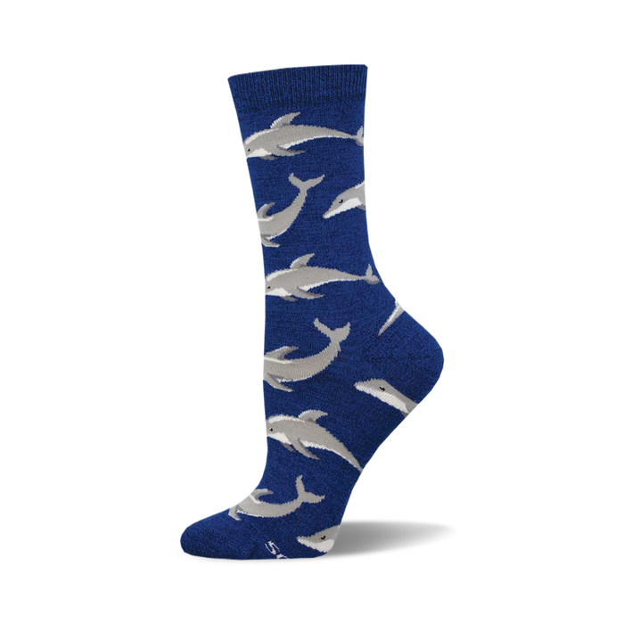 A single blue crew sock with a repeating pattern of light gray dolphins. Made of bamboo material. }}