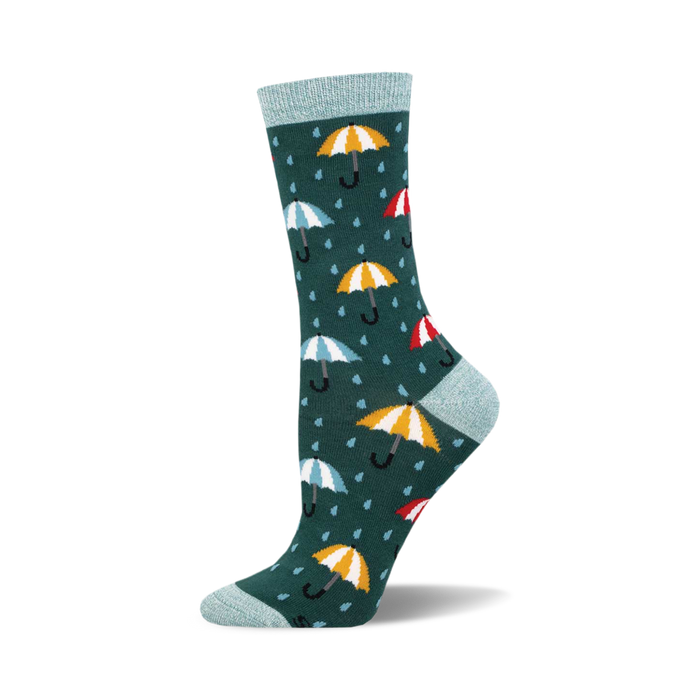 Crew socks in teal with a pattern of colorful umbrellas and raindrops. Soft bamboo material.  Fun and whimsical design. }}