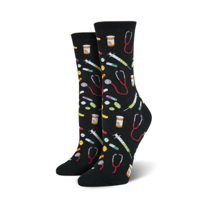 Pair of crew socks in black and blue; colorful pills, syringes, and stethoscopes are playfully scattered across the design.
