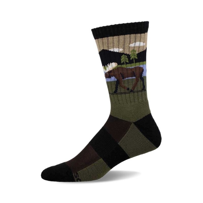 Crew socks in olive green, black, and beige, featuring a moose illustration and mountain landscape print.