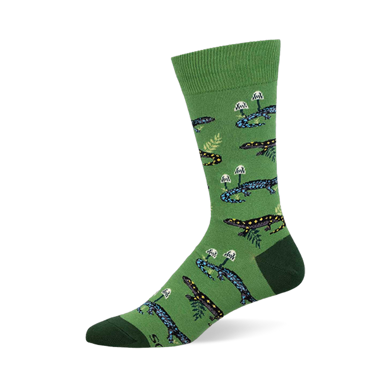 Green crew sock showing a woodland pattern of blue and black spotted salamanders, white mushrooms, and light green ferns.