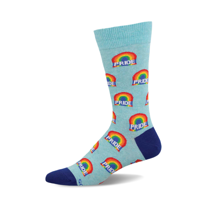 Crew socks in pastel blue with repeating rainbow designs and 'PRIDE' text. The socks have a navy blue cuff. }}